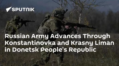 Soldados russos em formação avançam por área rural na República Popular de Donetsk. (Foto: sputnikglobe.com)